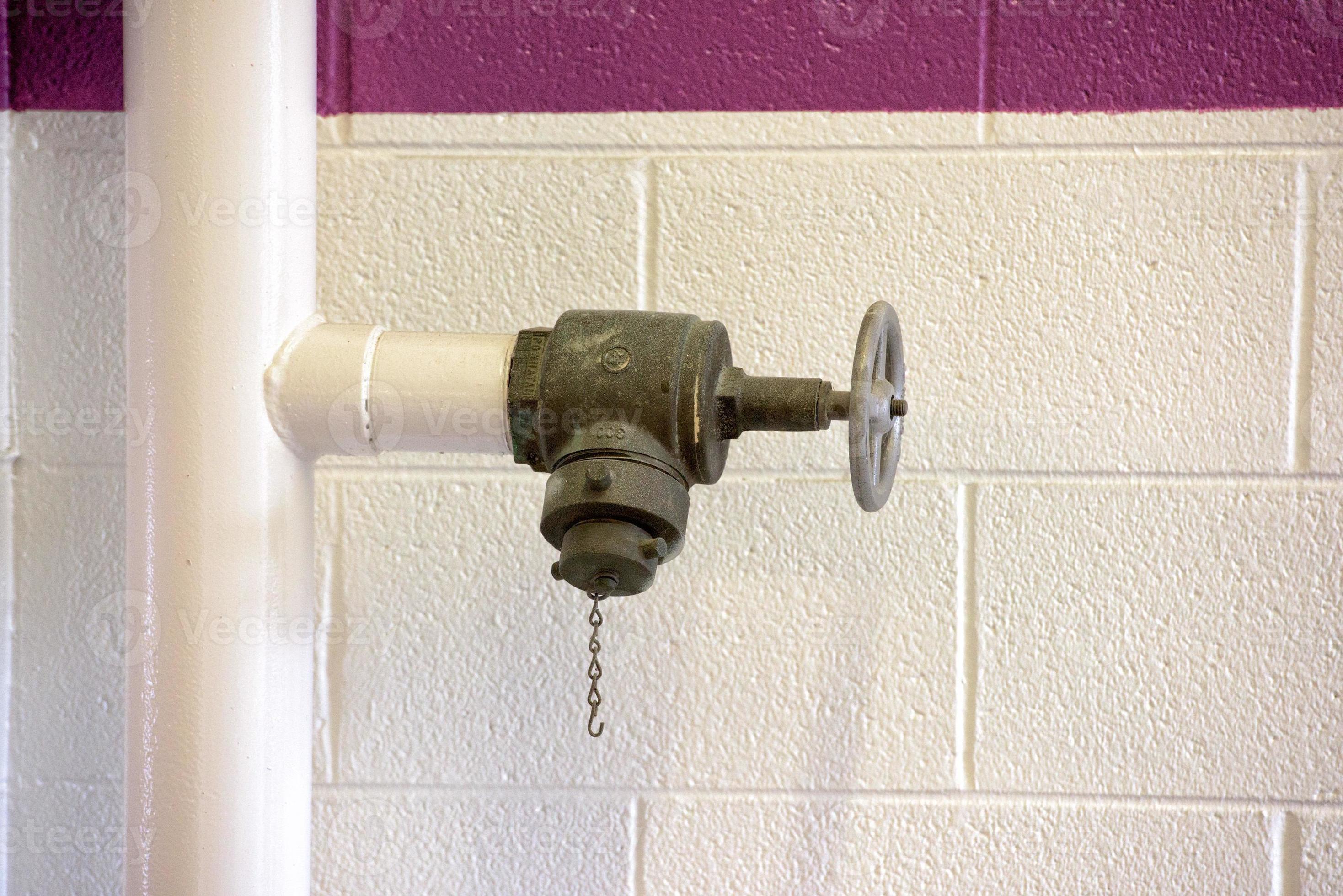 fire extinguisher connection pipe inside a car park 20420388 Stock