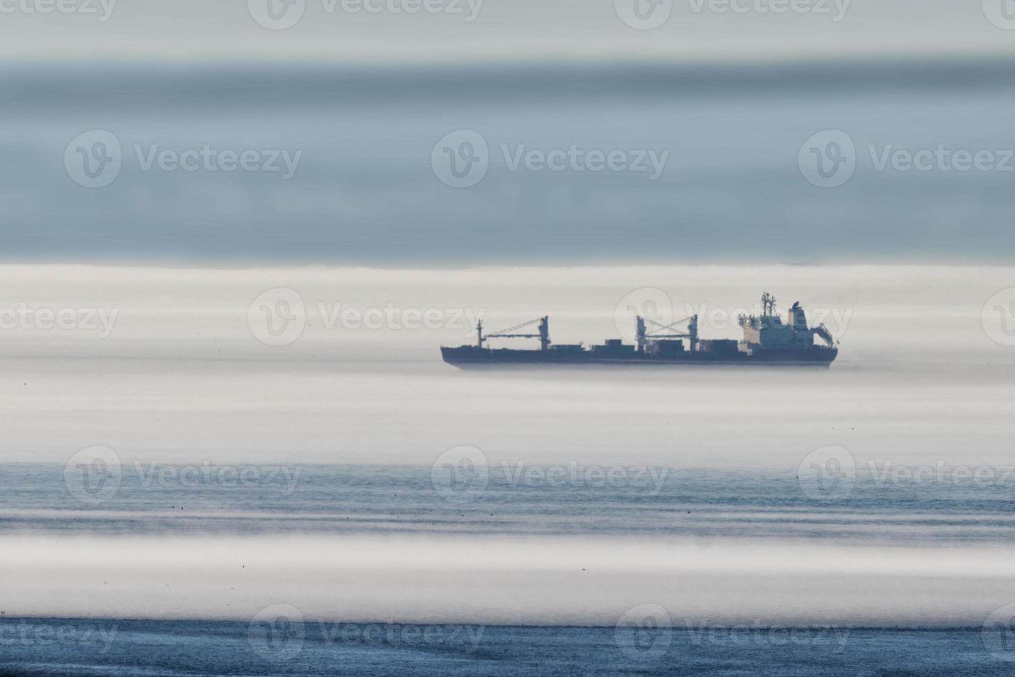 Ship in the fog background photo