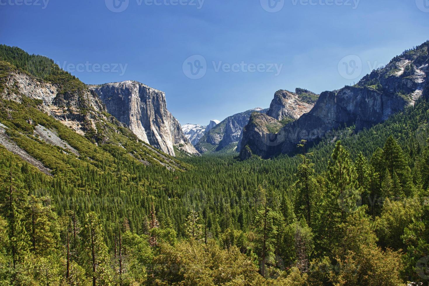 A beautifuly sunny view of yosemite valley park half dome photo