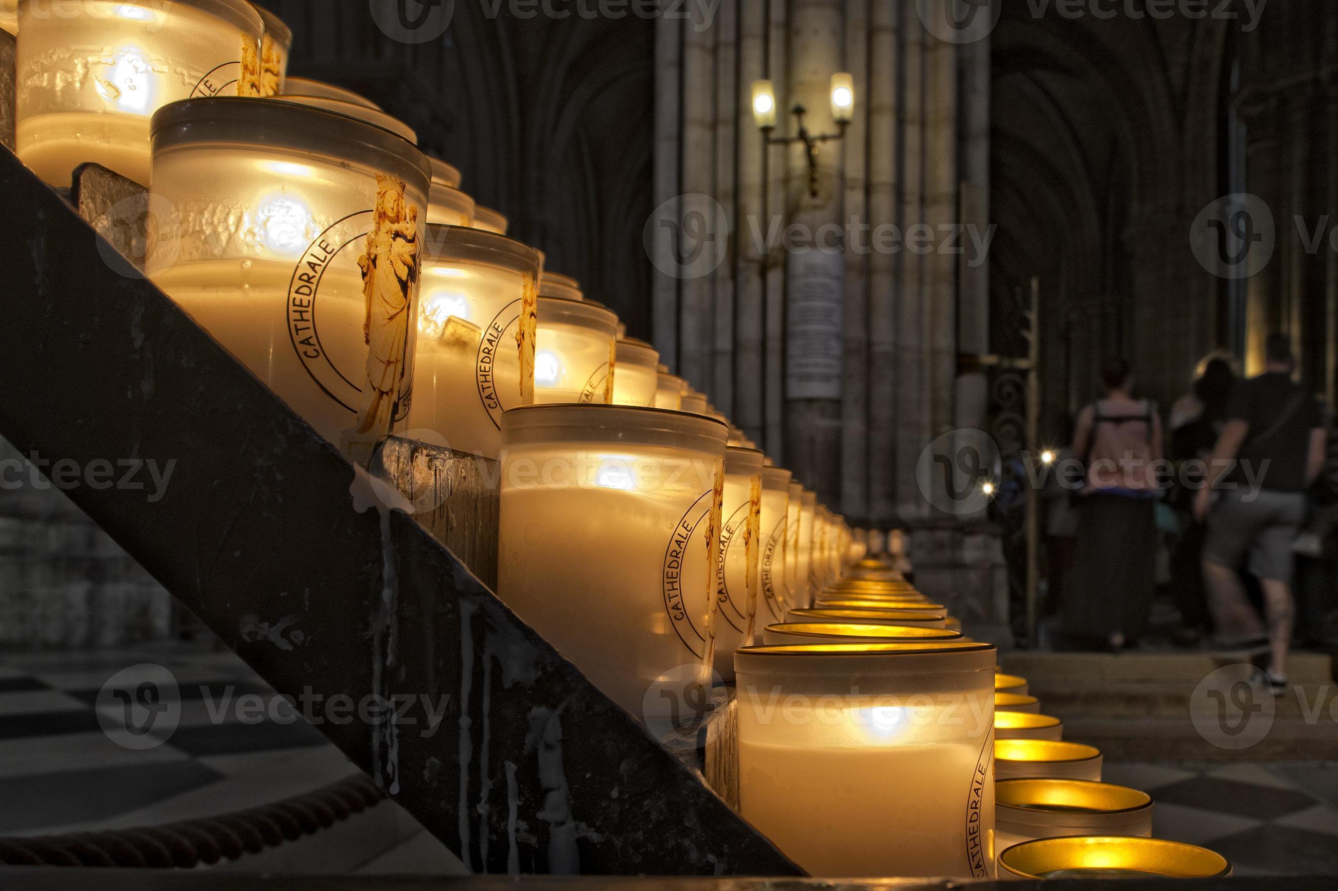 votive candles in paris cathedral 20420668 Stock Photo at Vecteezy