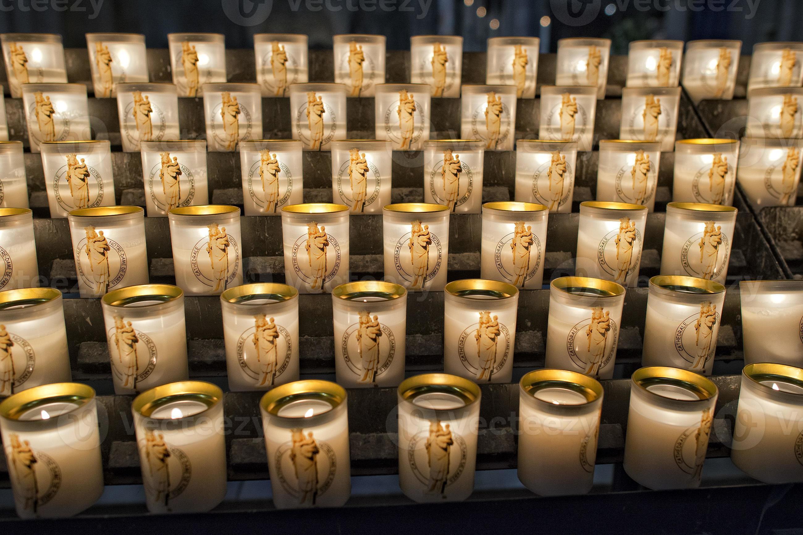 votive candles in paris cathedral 20421050 Stock Photo at Vecteezy