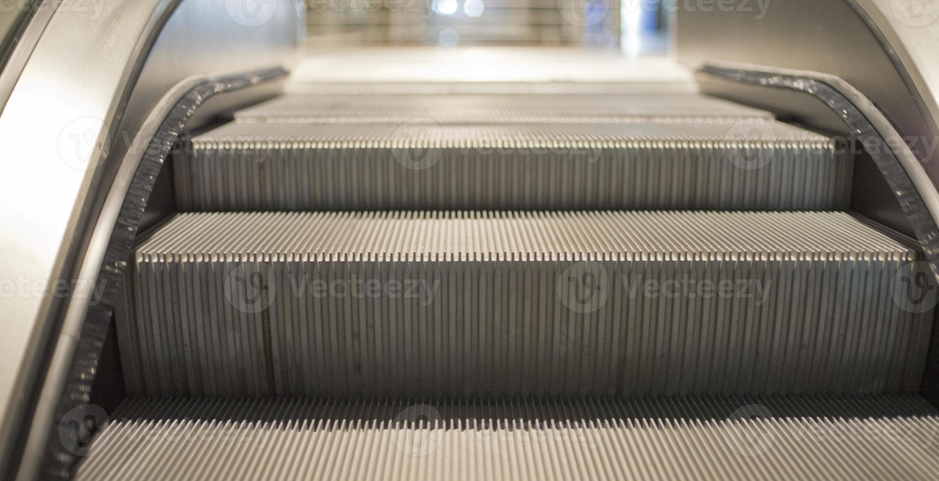 Metro underground escalator photo