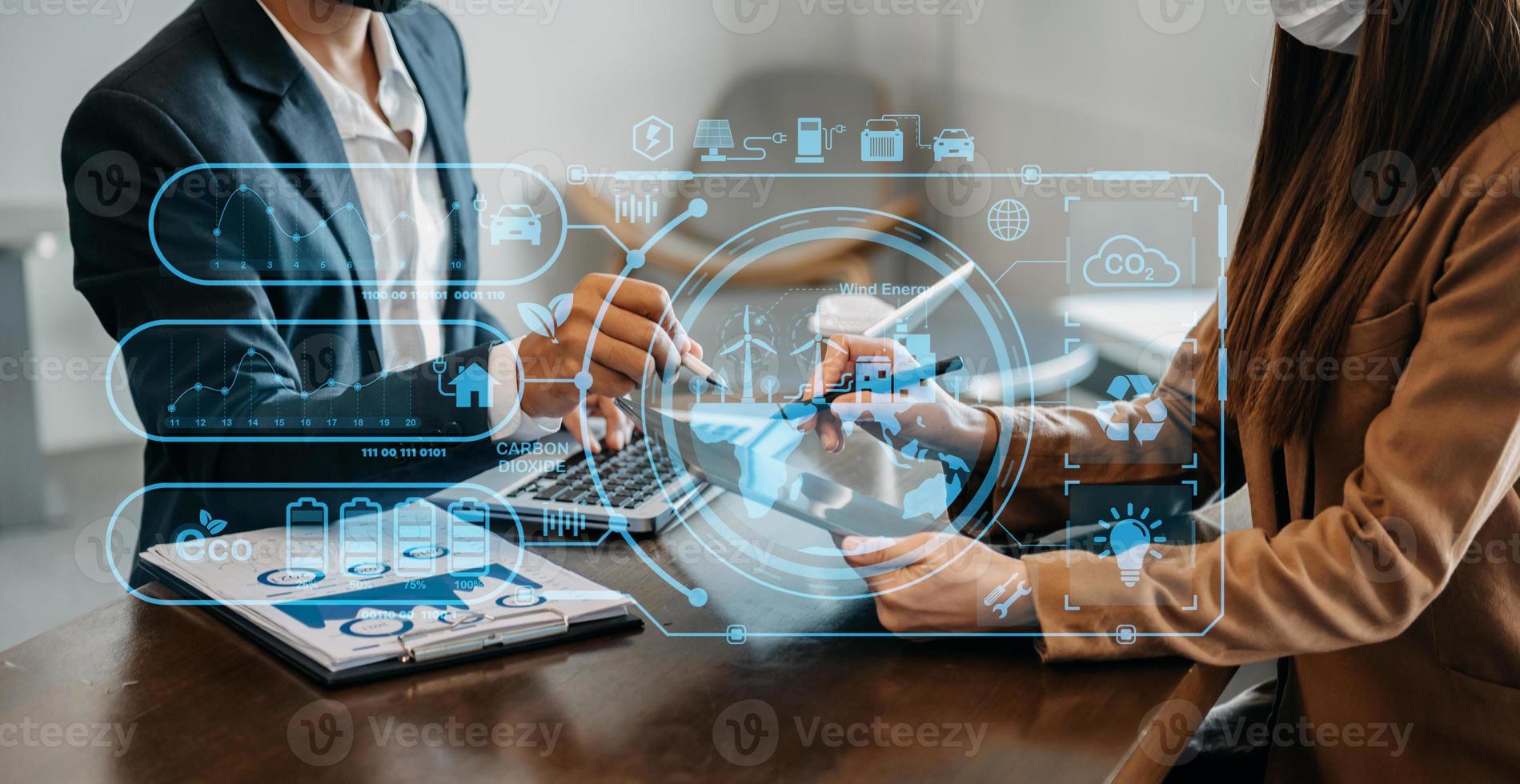 Business working with reduce CO2 concept with icons, global warming such as reforest green factory recycle and zero carbon dioxide emission concept. with VR icon at office photo