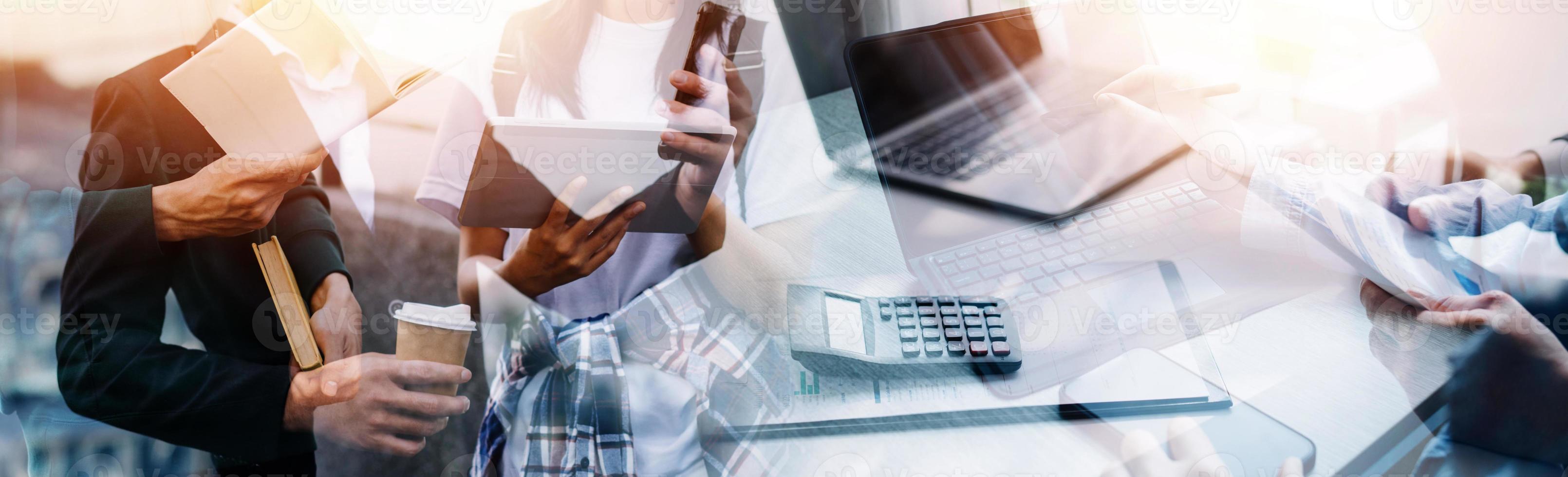 Financial analysts analyze business financial reports on a digital tablet planning investment project during a discussion at a meeting of corporate showing the results of their successful teamwork. photo