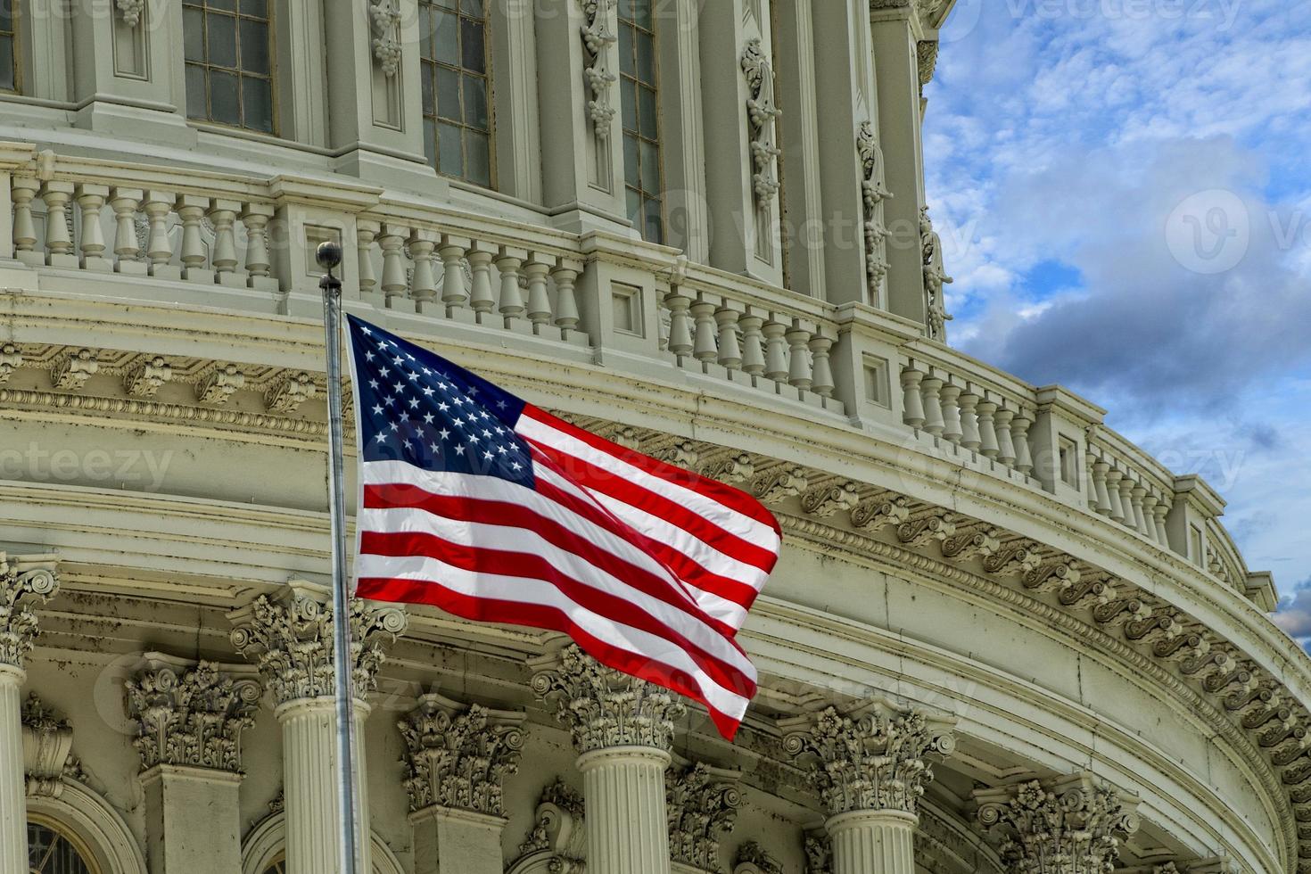 Washington DC Capitol detail on cloudy sky photo