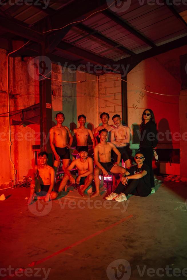 a group of adult men are having a reunion with their friends on new year's eve photo