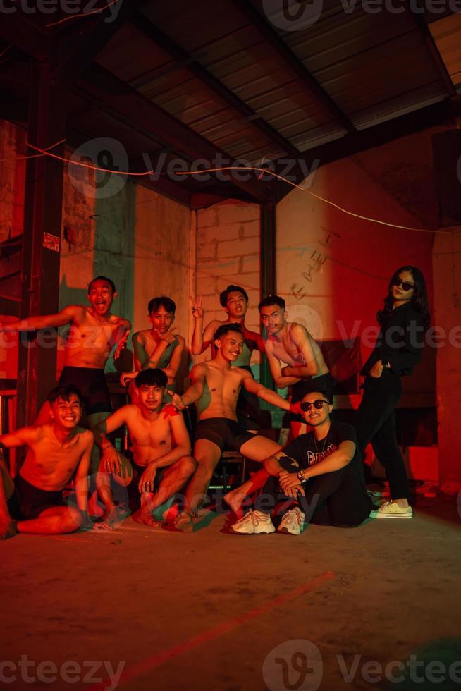 a group of adult men are having a reunion with their friends on new year's eve photo