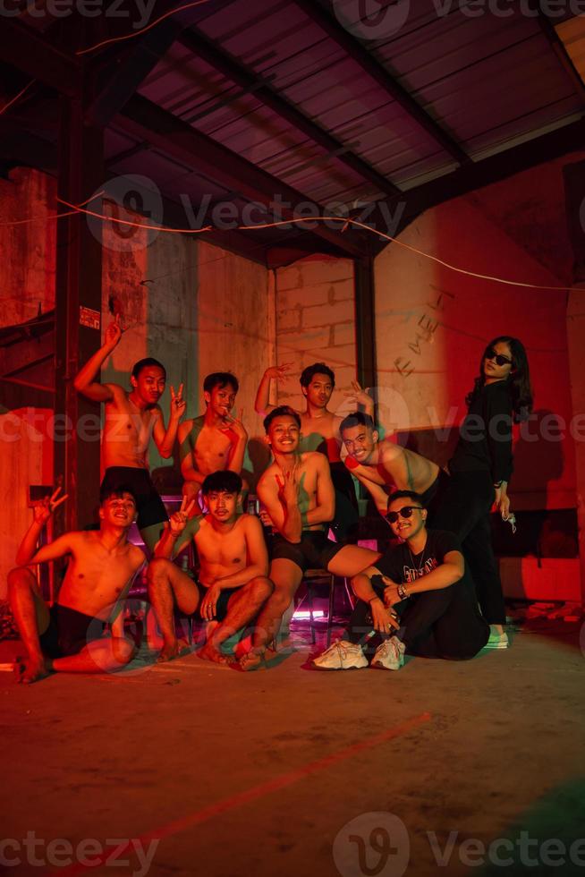 a group of adult men are having a reunion with their friends on new year's eve photo