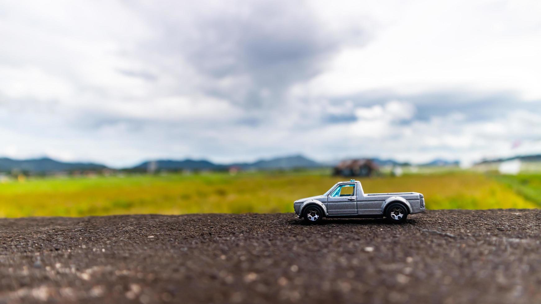 minahasa, Indonesia  January 2023, toy car in the rice field photo