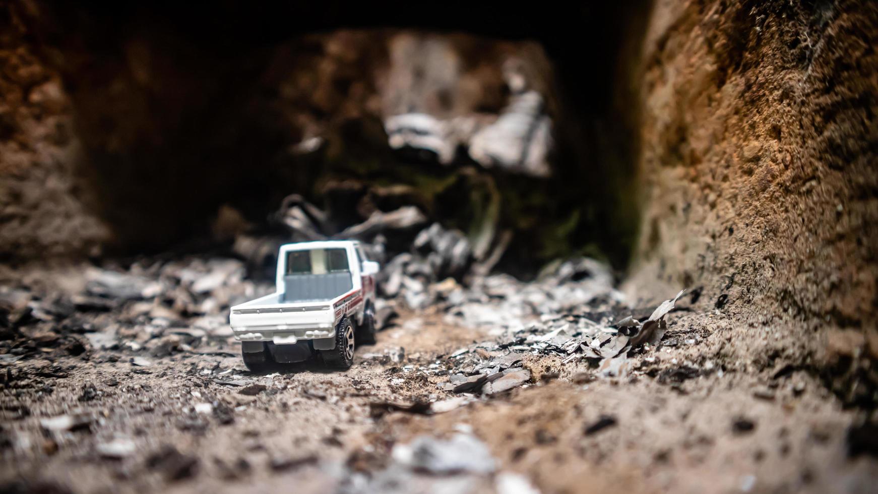 South Minahasa, Indonesia  January 2023, the toy car in the furnace looks like in a cave photo