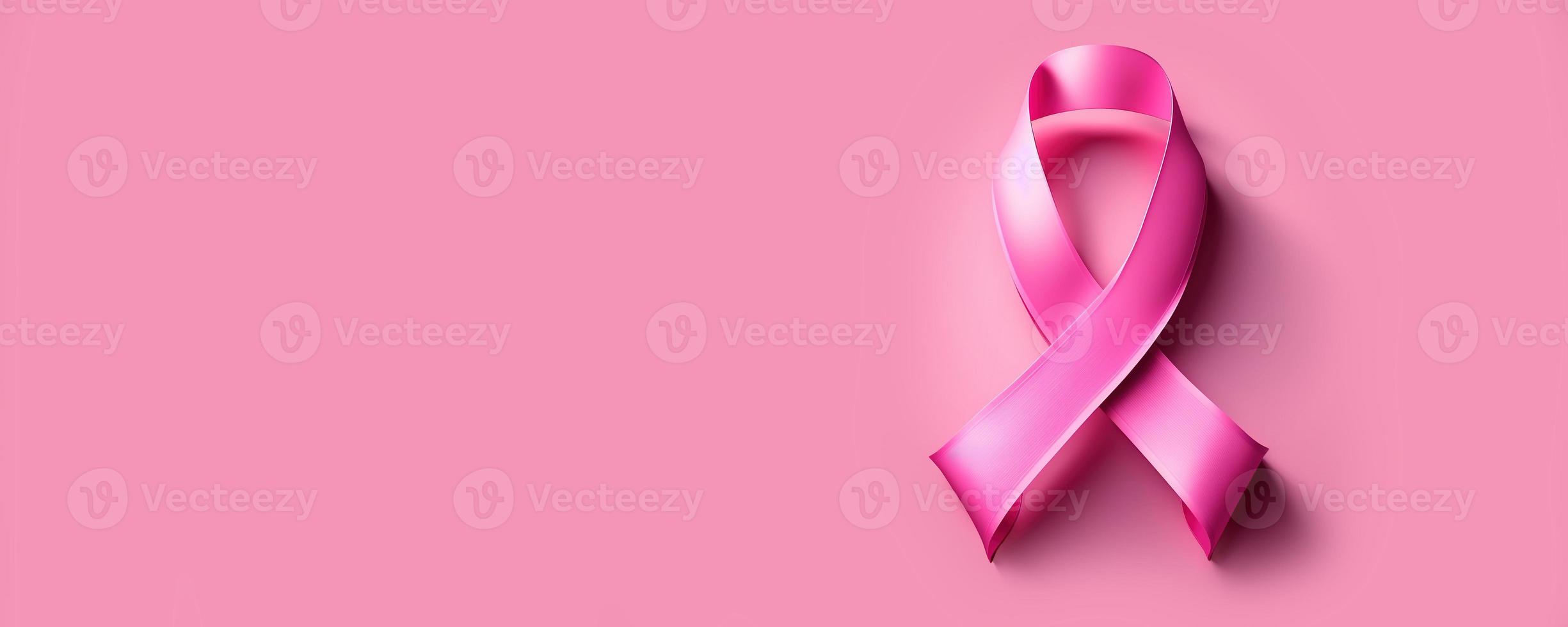 Pink cancer awareness ribbon banner with copy space photo