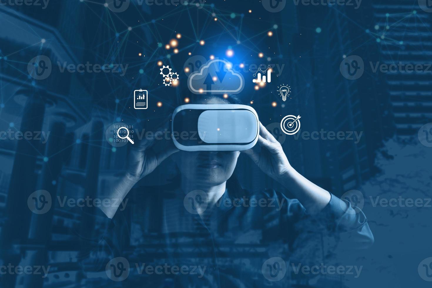 Businesswoman wearing VR glasses and accessing the Cloud Computing Technology Internet Storage Network Concept And a large database big data Through internet technology. Metaverse technology idea. photo