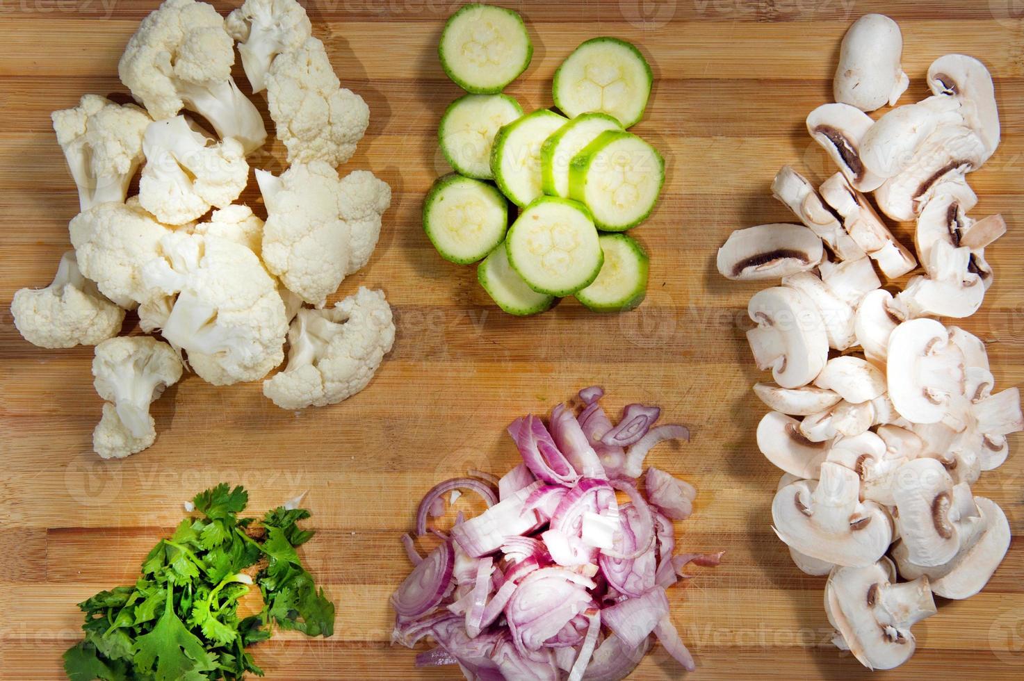 Raw ingredients. Ready to be cooked. Recipe for chiken stew, European cuisine, cooked with a garnish of mushrooms, small onions and ohter. photo