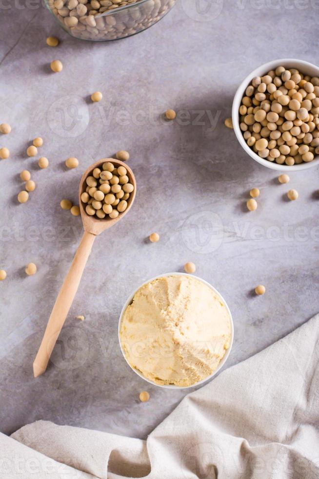 Traditional fermented soy miso seasoning in a bowl. Japanese food. Top and vertical view photo