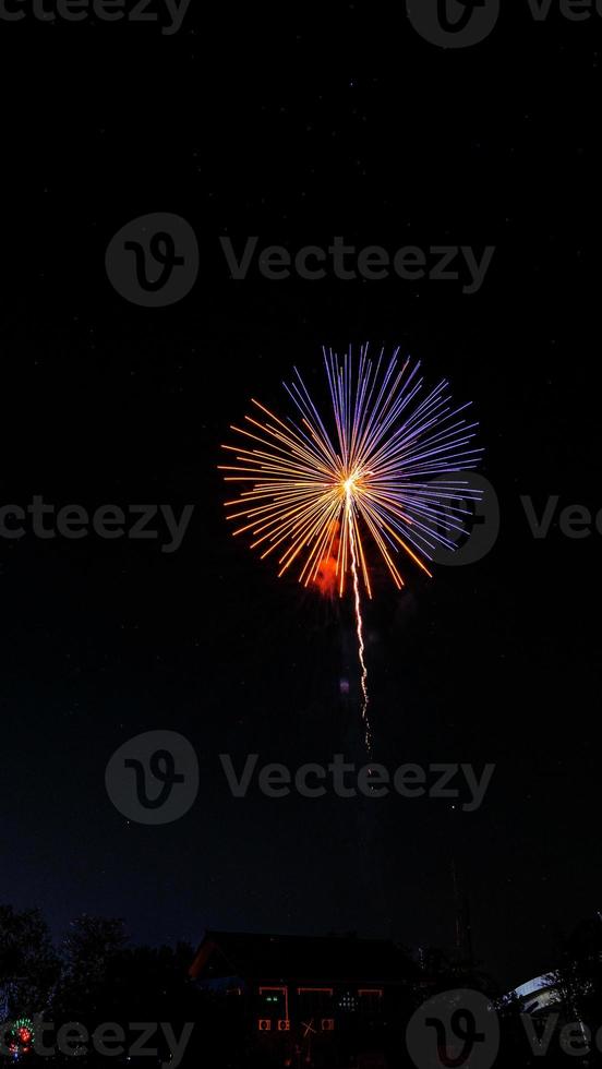 fireworks over the temple in the dark sky photo