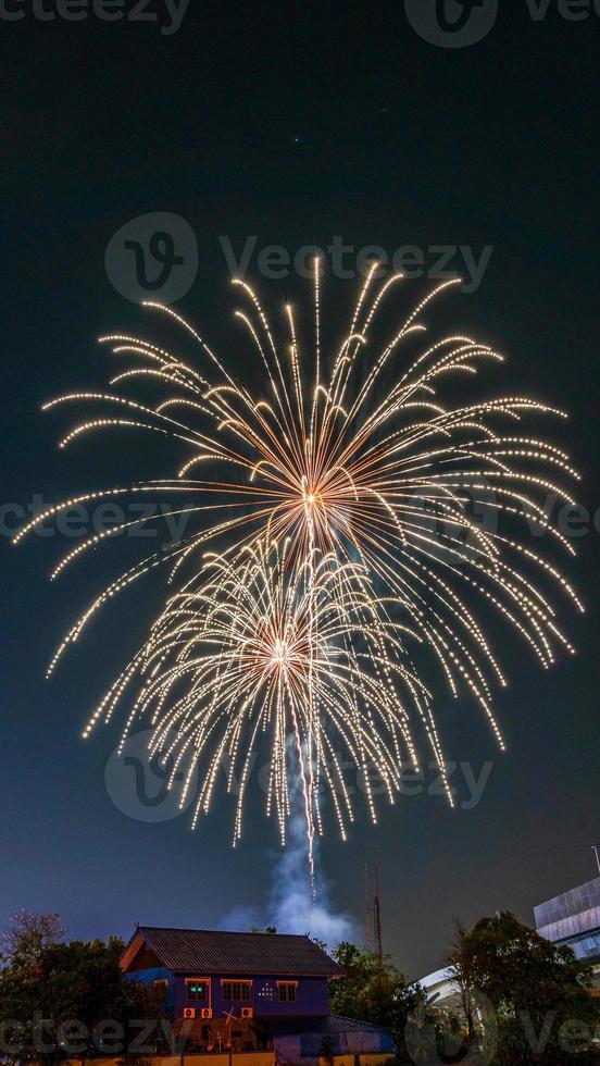 fireworks over the temple in the dark sky photo