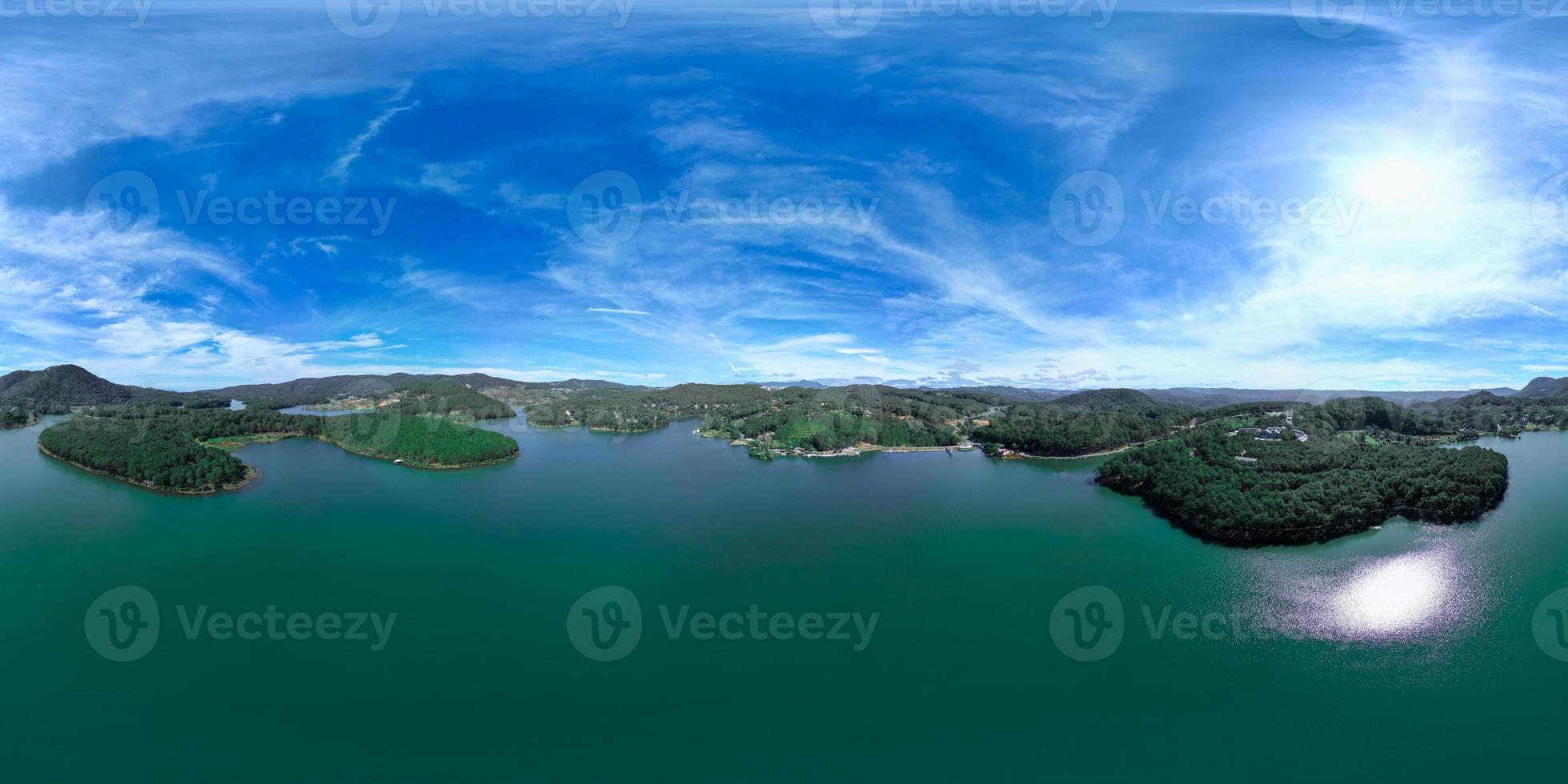 360 Panorama of Serene Tuyen Lam Lake amidst Lush Green Forest and Majestic Mountains in Da Lat, Vietnam photo