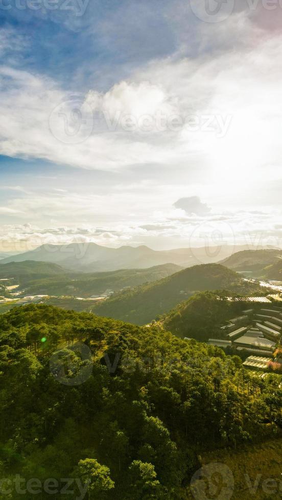 Mesmerizing Mountain Skyline HDR Shot of Da Lat City, Vietnam with Stunning Blue Sky and Majestic Mountains on the Horizon photo