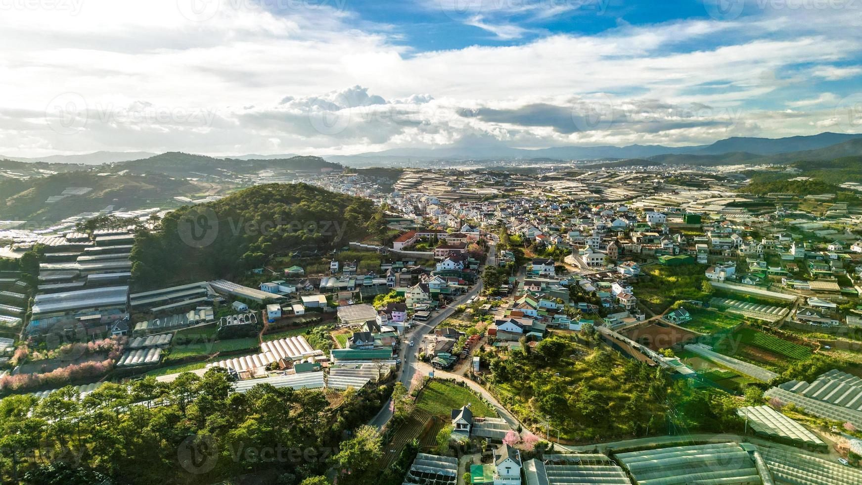 Mesmerizing Mountain Skyline HDR Shot of Da Lat City, Vietnam with Stunning Blue Sky and Majestic Mountains on the Horizon photo