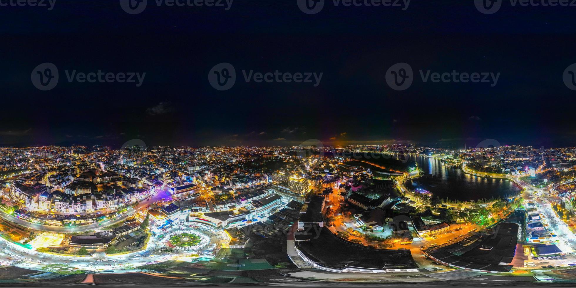 360 Panorama of Vibrant Nightlife in Da Lat City, Vietnam A Stunning View of City Lights Reflected on Xuan Huong Lake with Da Lat Market Bustling in the Background photo