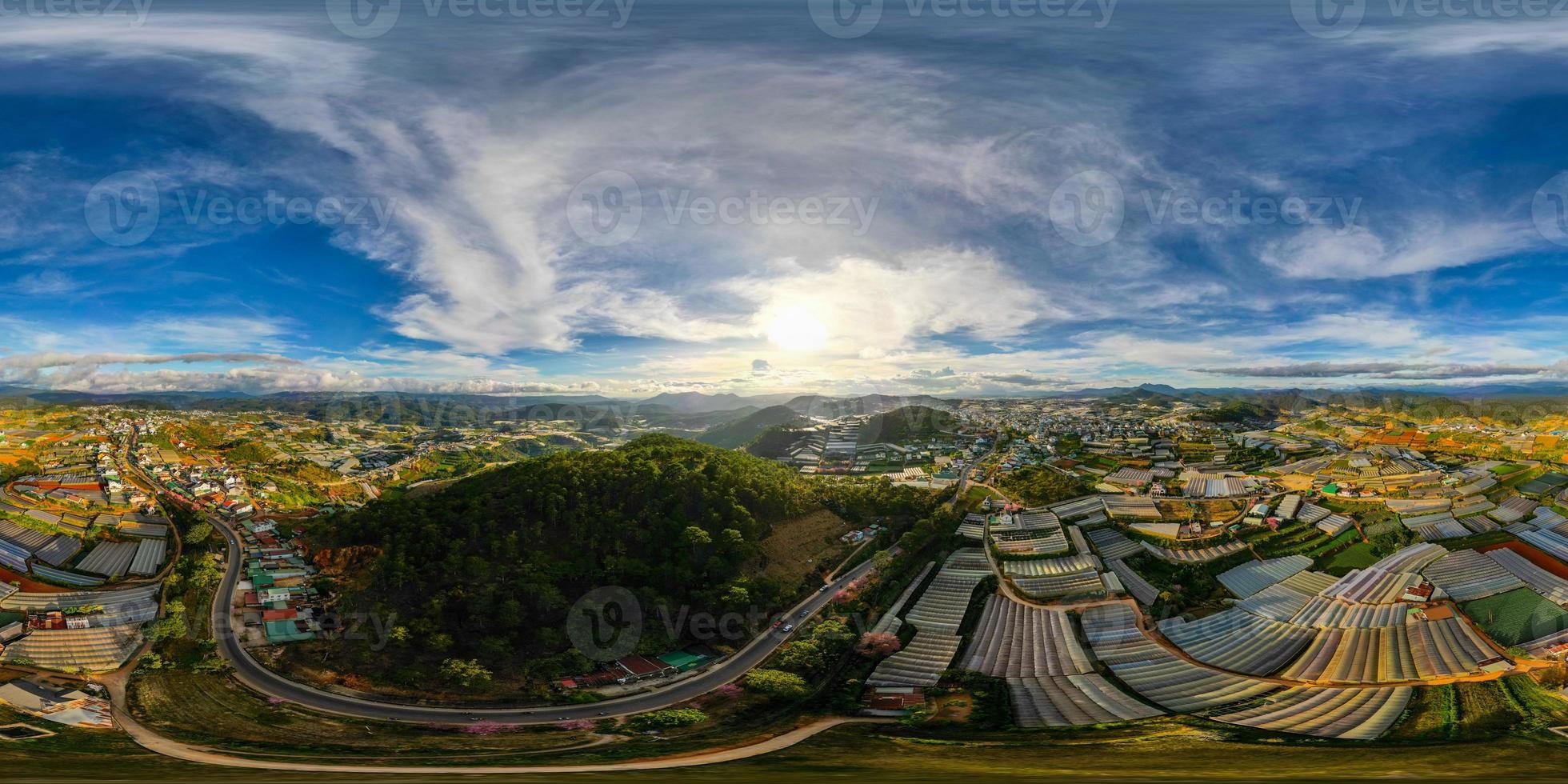 360 Panorama of Breathtaking Mountain Skyline in Da Lat City, Vietnam A Stunning View of Cityscape and Majestic Mountains under the Blue Sky photo