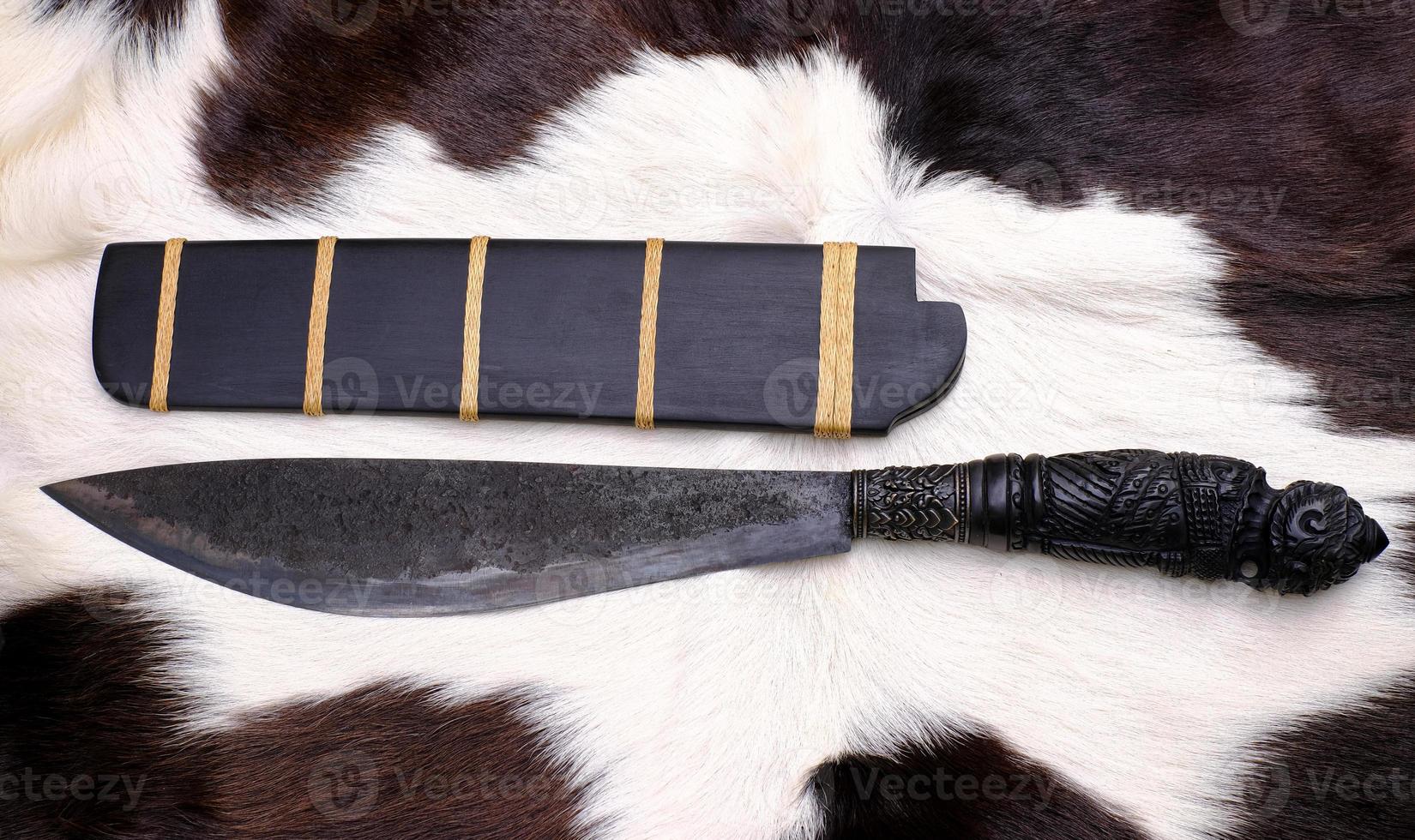 Amulet knife of Native Thailand knife with ebony wood sheath is handmade in Thailand for protection luckily photo