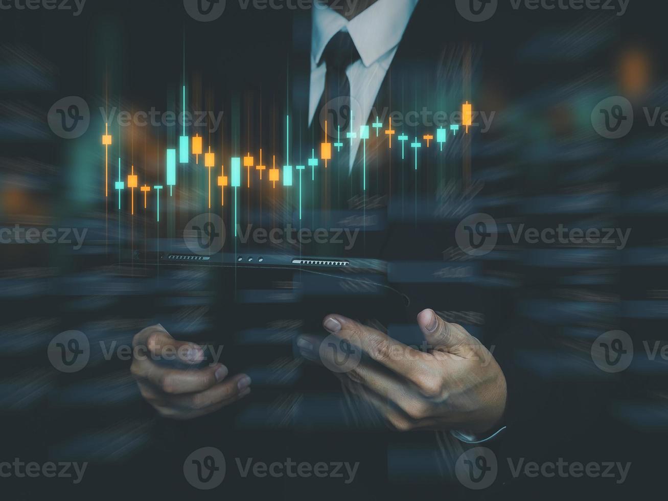 stock market investment ideas business people using Tablet to analyse financial graphs profits digitally. photo