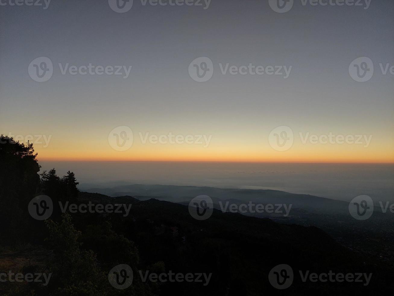Mountain panoramic view at sunset photo