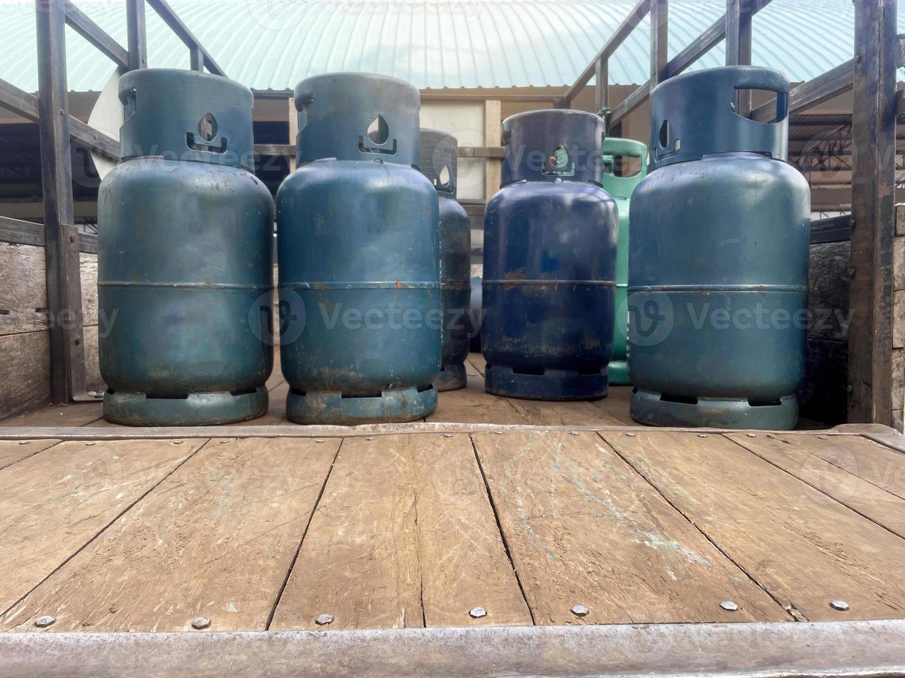 Cooking gas tanks on the cars of gas delivery shops to serve customers at home. Soft and selective focus. photo