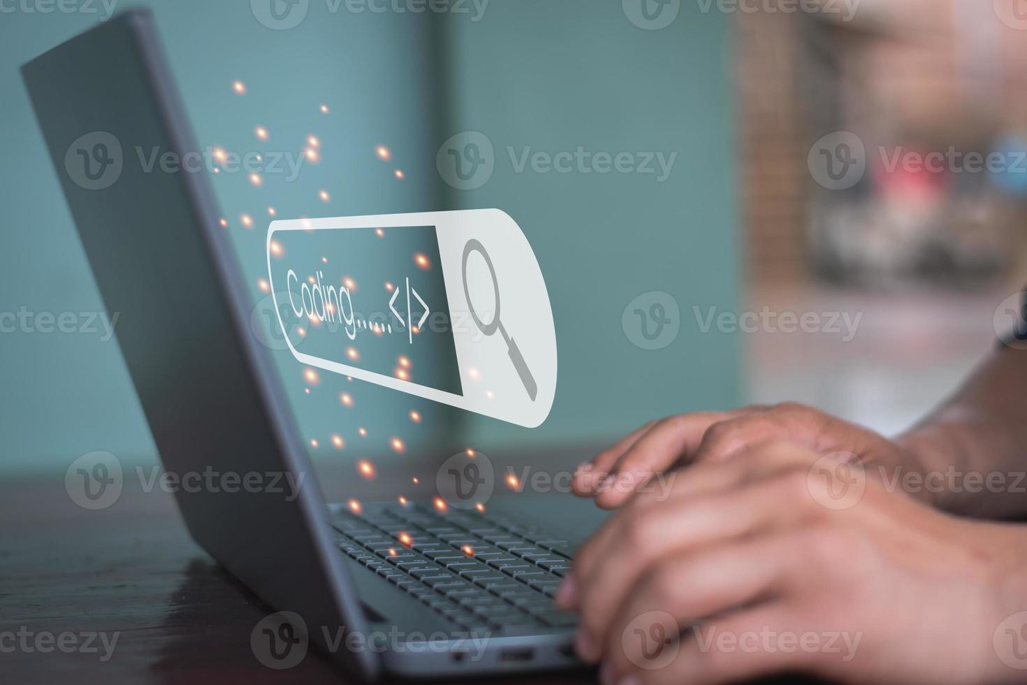A man searching how to learn coding at home photo