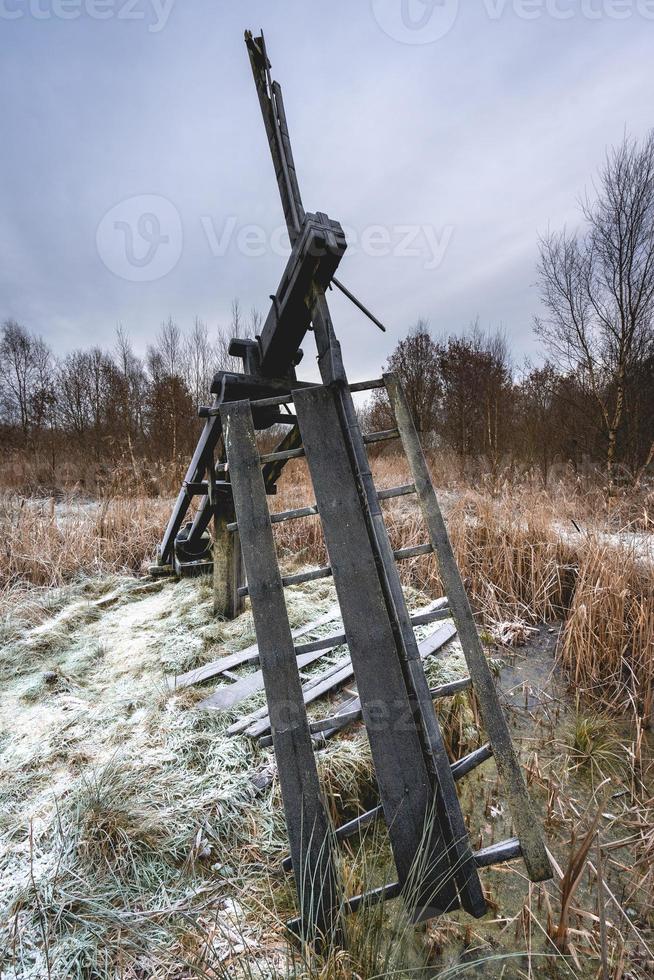 Old Tjasker, an old small windmill from Friesland, The Netherlands. photo