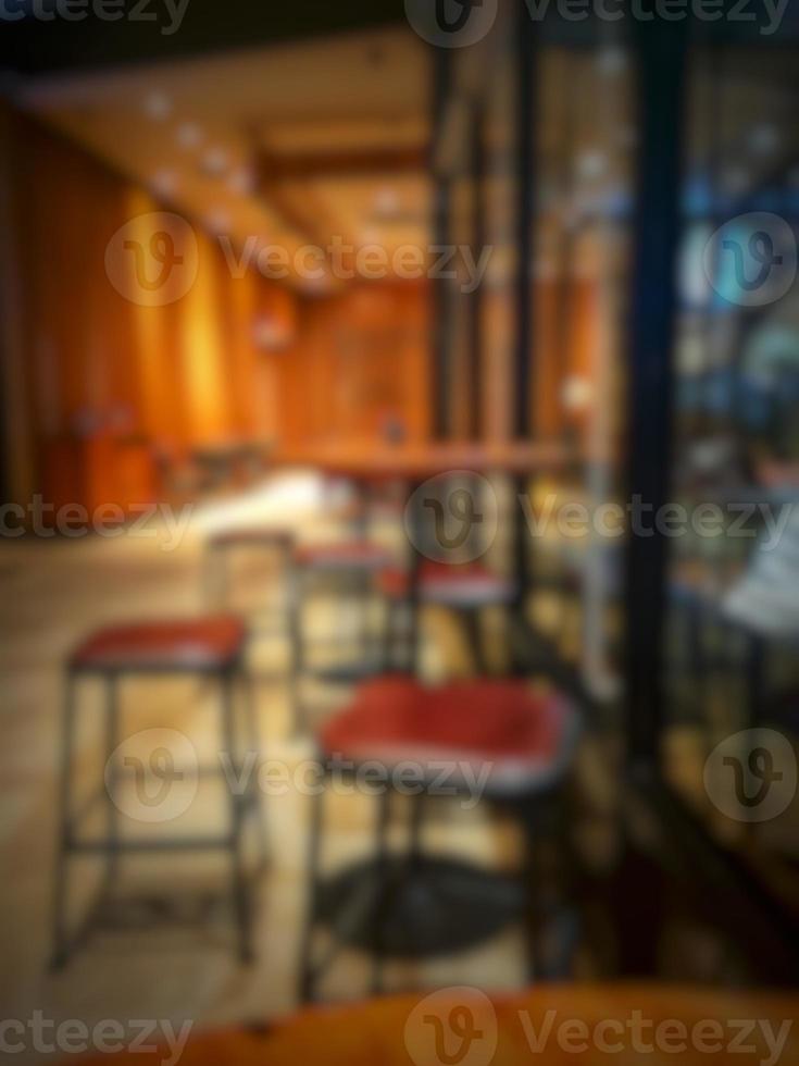 Defocused blurred photo of the interior of a Starbucks cafe in East Jakarta.