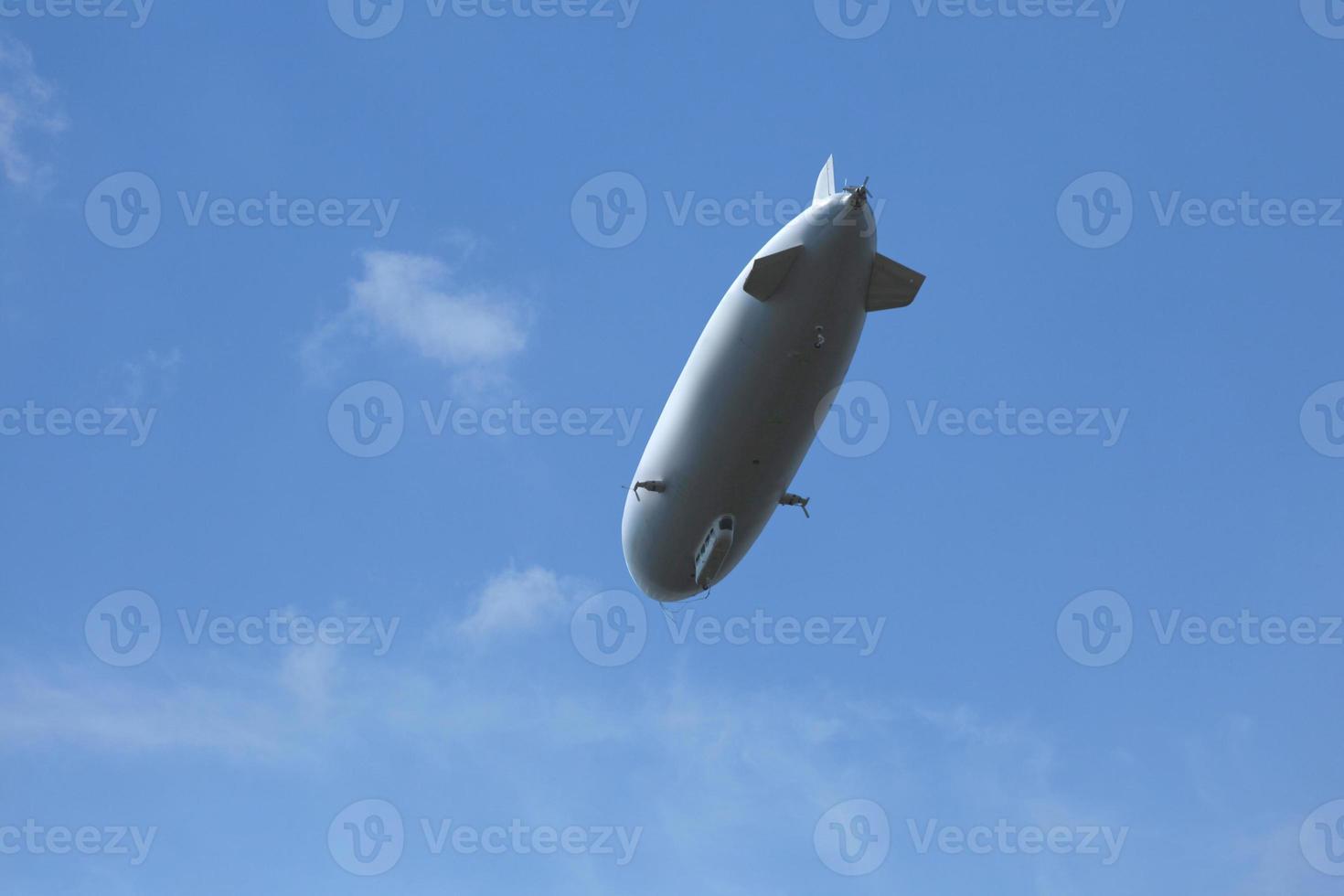 White zeppelin seen from below photo