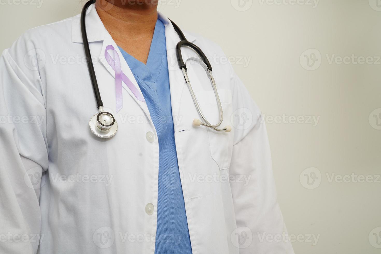 Asian woman doctor with purple ribbon, World Pancreatic Cancer day or World Alzheimer day. photo