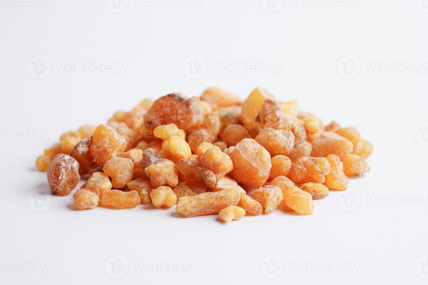 Frankincense or olibanum aromatic resin isolated on white background used in incense and perfumes. photo