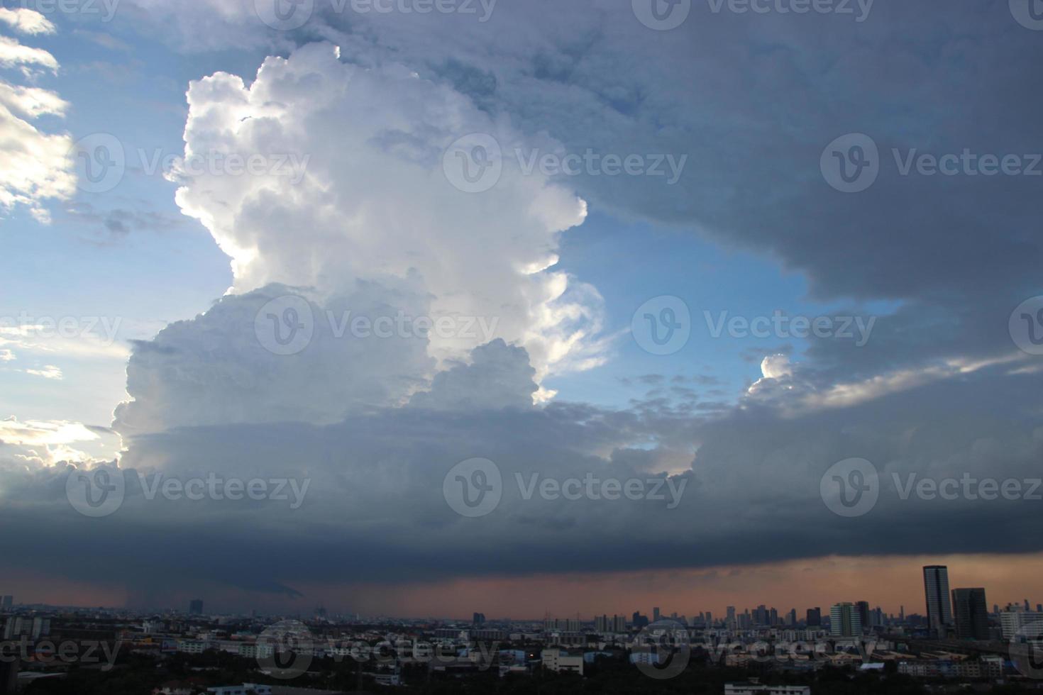 dark blue cloud with white light sun set sky background and city light midnight evening time photo