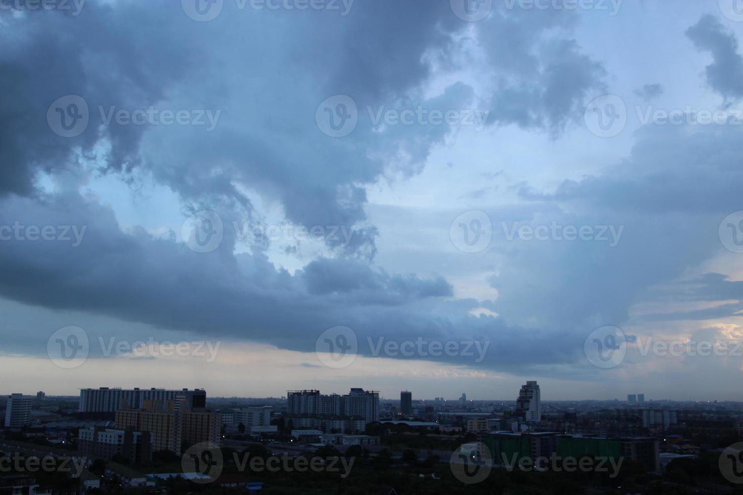 dark blue cloud with white light sunset sky background and city light midnight evening time photo