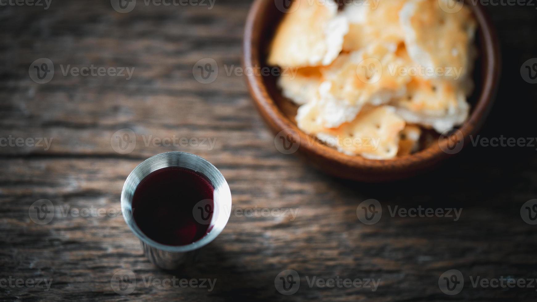 Concept of Eucharist or holy communion of Christianity. Eucharist is sacrament instituted by Jesus. during last supper with disciples. Bread and wine is body and blood of Jesus Christ of Christians. photo