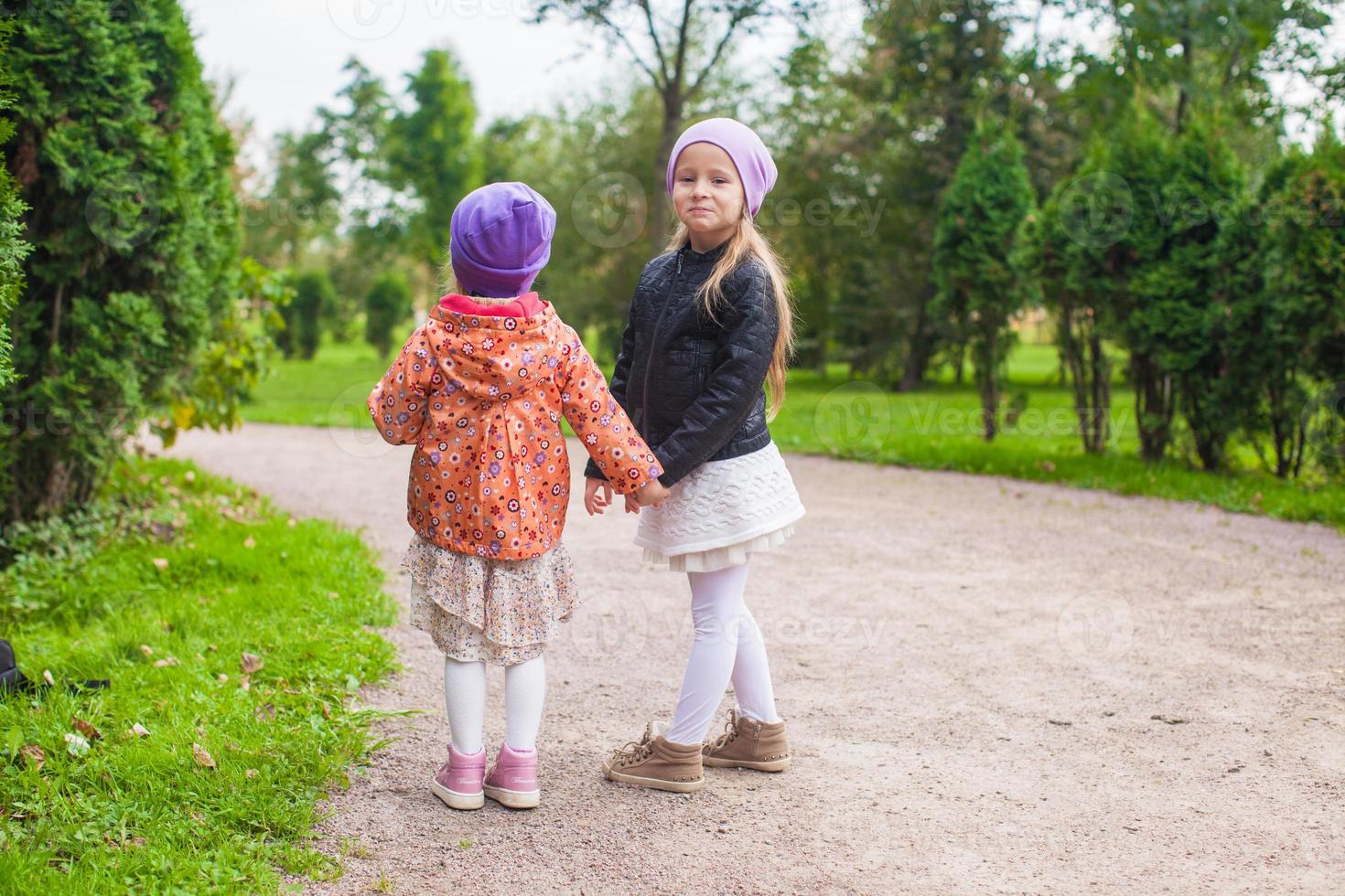 Little sisters on the park photo