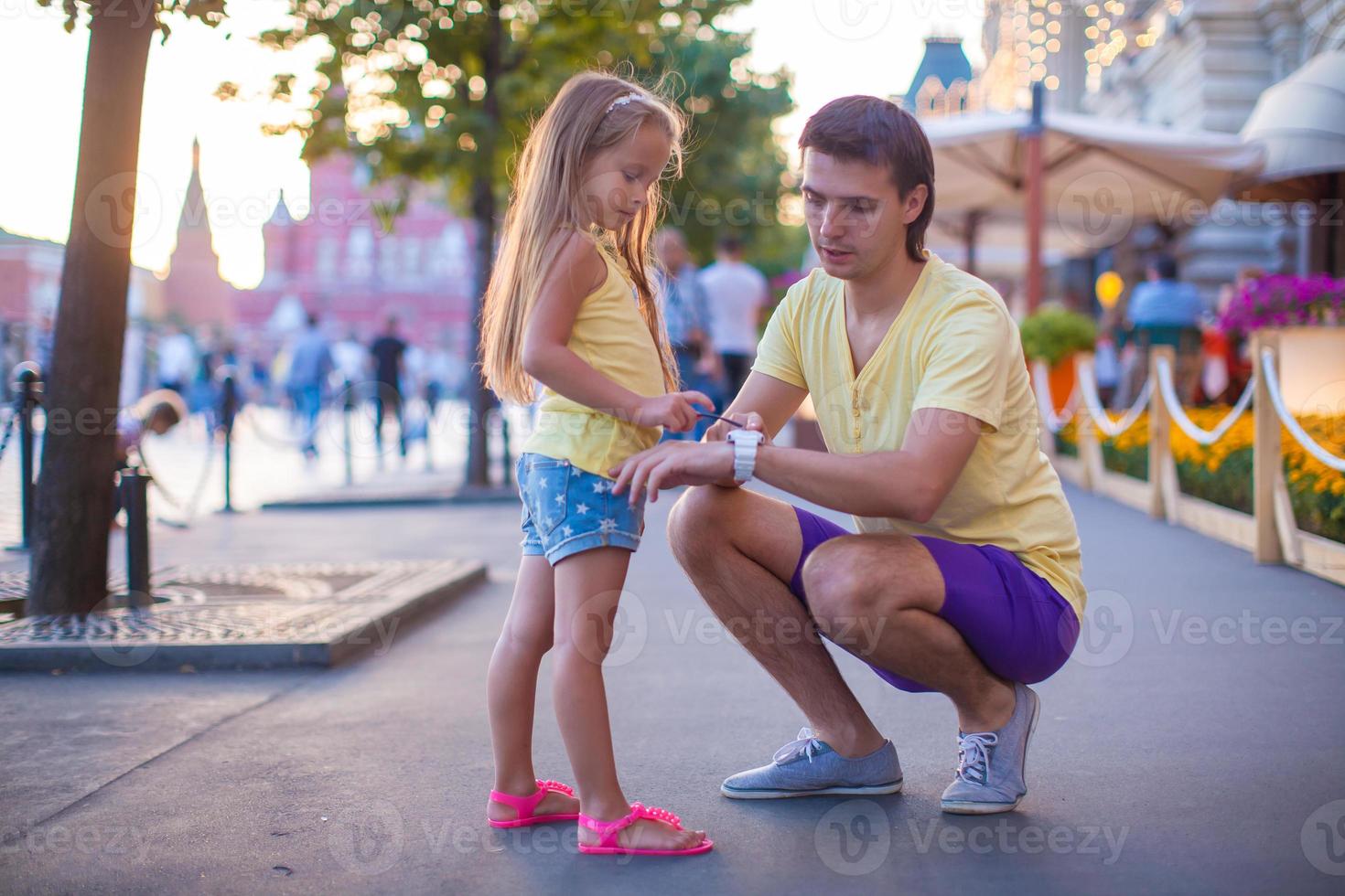 Father and daughter outdoors photo