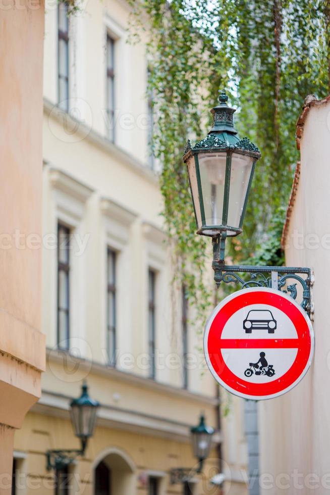 Outdoor lamp and street sign view photo