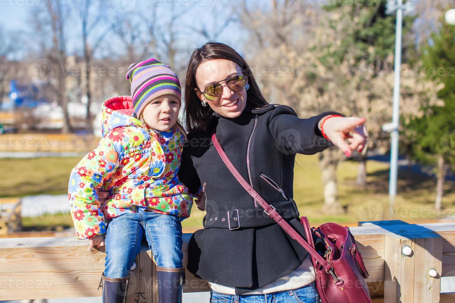 Mother and daughter on the park photo
