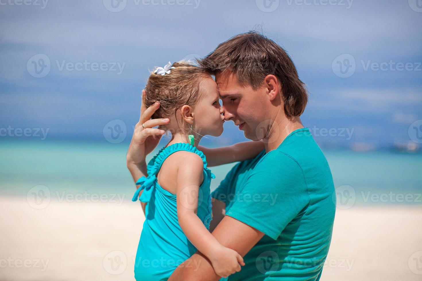 familia en un playa viaje foto