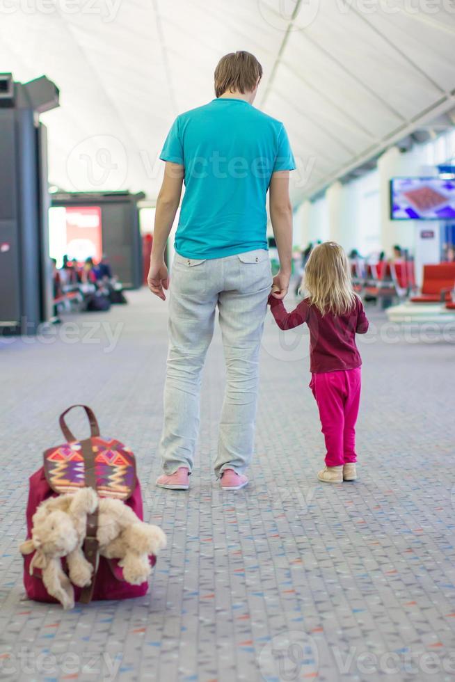 Father and daughter on the airport photo