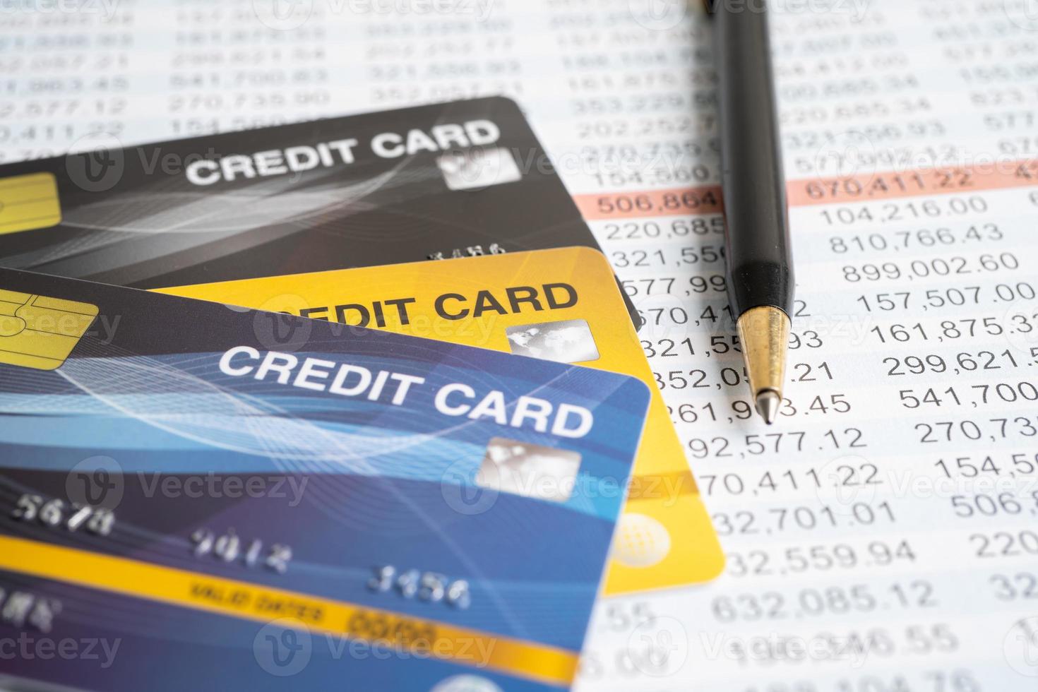 Credit card model on spreadsheet paper. Finance development, Banking Account, Statistics, Investment Analytic research data economy, Stock exchange trading, Business company concept. photo