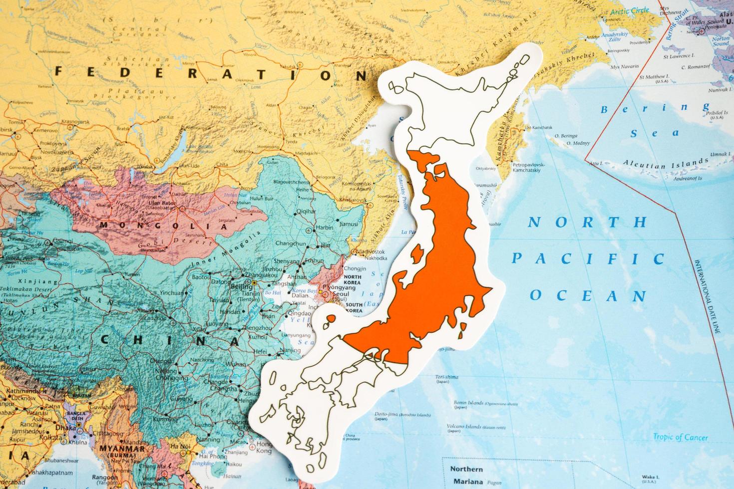 Bangkok, Thailand February 7, 2022, Japan flag on world map background. photo