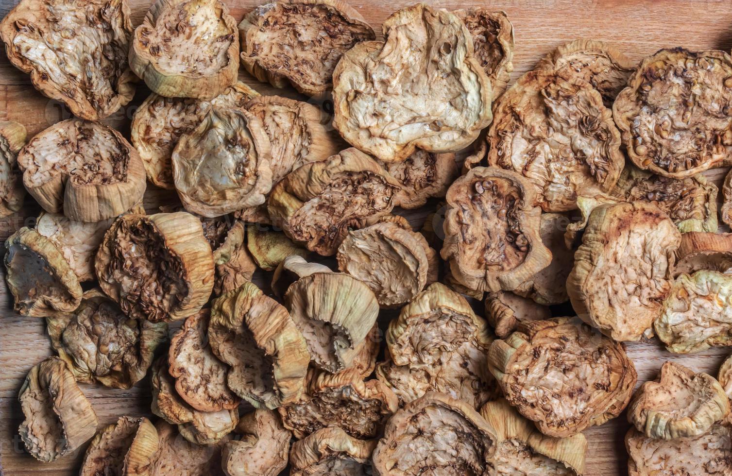 Dried eggplant as a background. Dried eggplants texture pattern background. photo