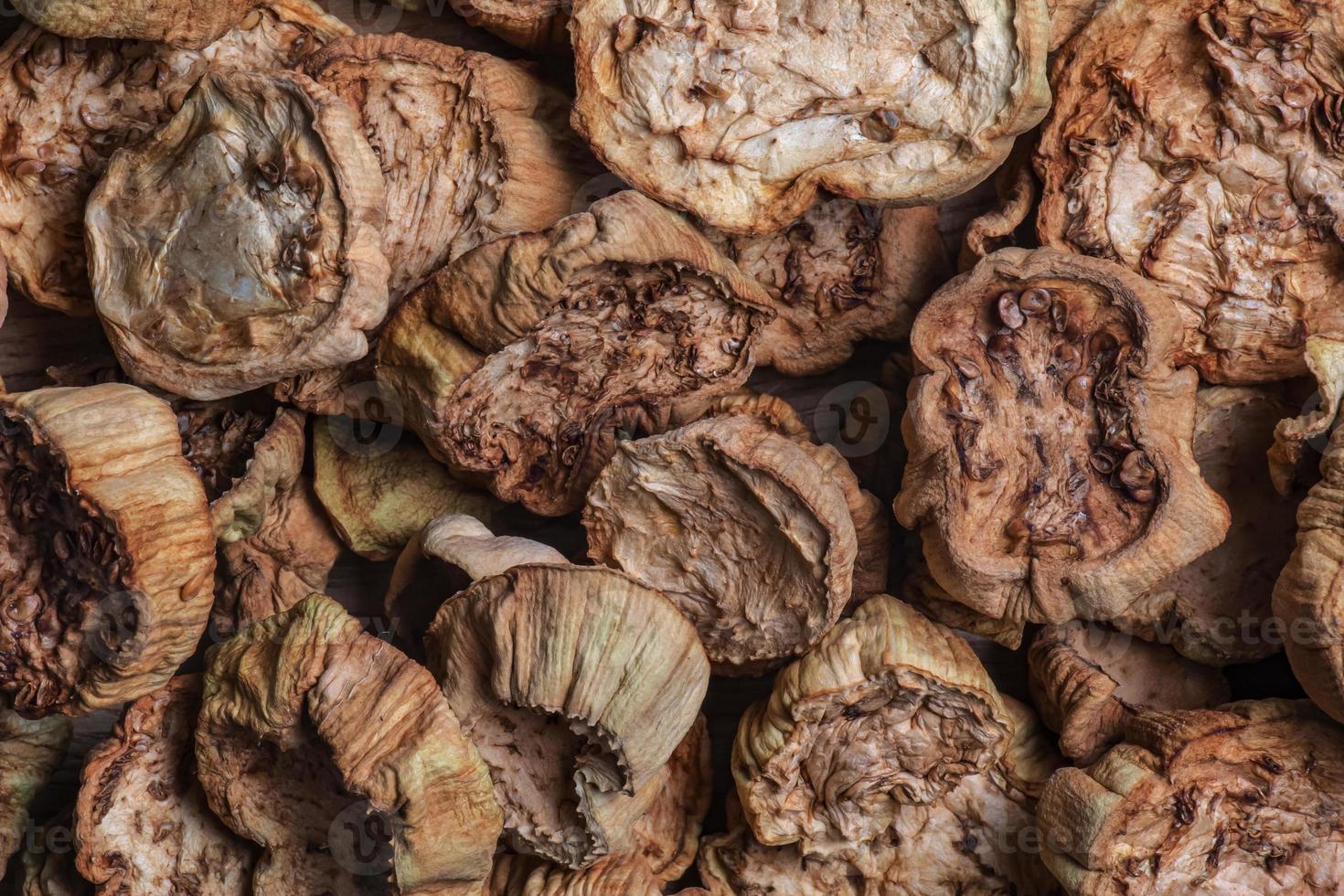 Dried eggplant as a background. Dried eggplants texture pattern background. photo