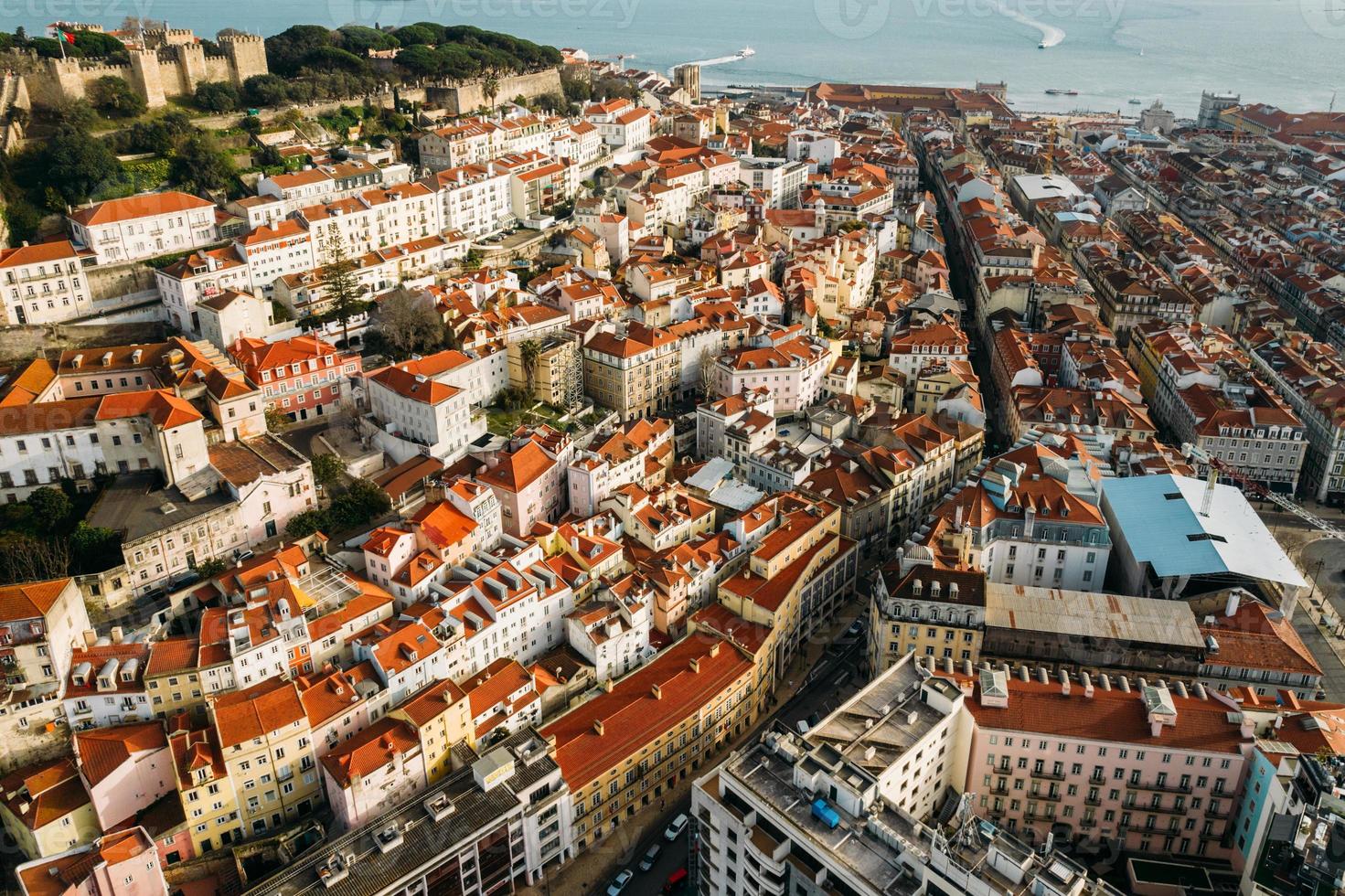 Aerial drone view of St. George Castle in Lisbon, Portugal with surrounding cityscape photo
