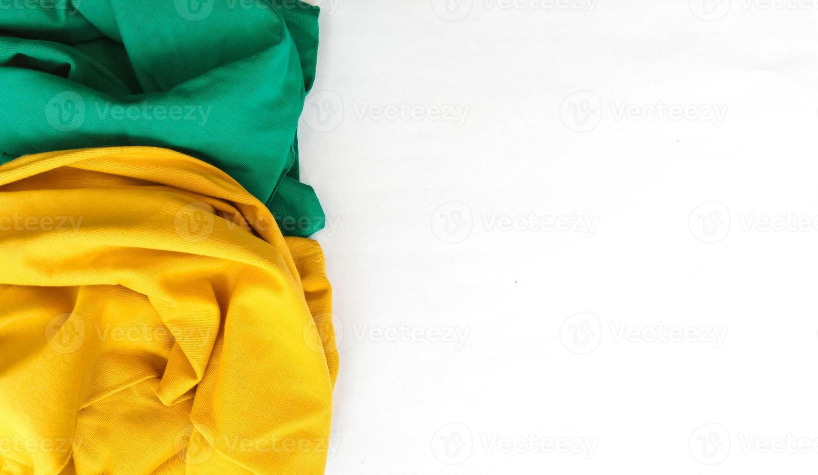 green and yellow fabric with negative space area photo